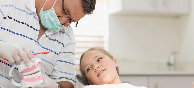 Dentist and female patient
